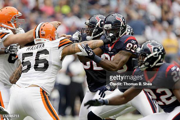 Wide receiver Bryant Johnson of the Houston Texans against linebacker Kaluka Maiava of the Cleveland Browns on November 6, 2011 at Reliant Stadium in...