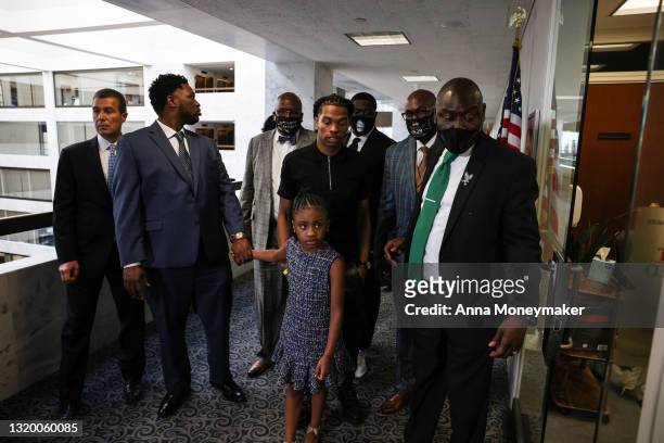 Attorney Ben Crump and Gianna Floyd, George Floyd's daughter, arrive at U.S. Sen. Cory Booker's office in the Hart Senate Office Building on May 25,...