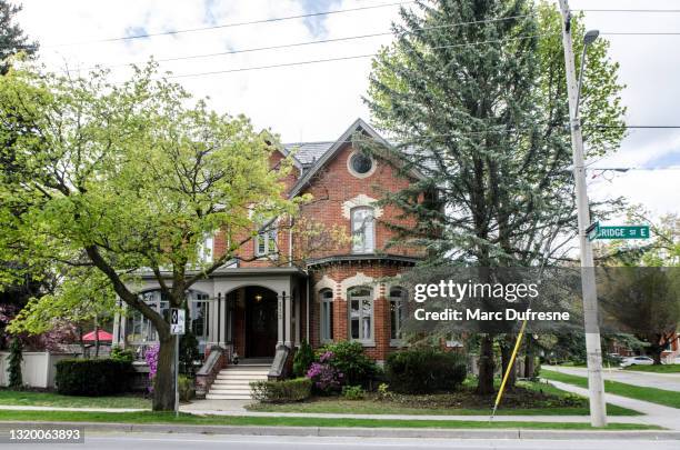 opulent houses on bridge street in belleville - belleville ontario stock pictures, royalty-free photos & images