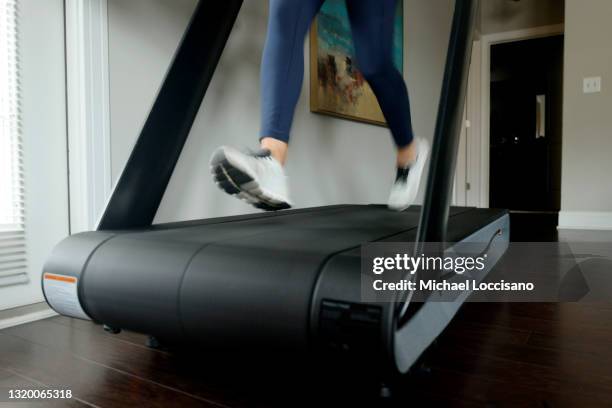 Liza Lecher works out on her Peloton Tread+ treadmill on May 24, 2021 in Williamstown, New Jersey. Earlier this month, Peloton recalled its Tread and...