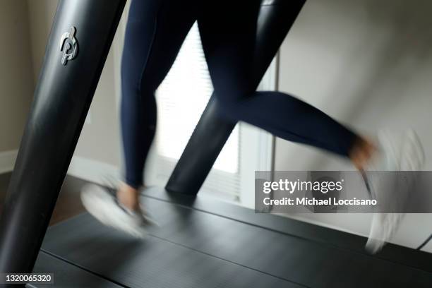 Liza Lecher works out on her Peloton Tread+ treadmill on May 24, 2021 in Williamstown, New Jersey. Earlier this month, Peloton recalled its Tread and...