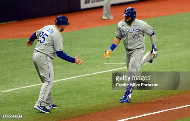Carlos Santana of the Kansas City Royals rounds the bases in the fourth inning after hitting a solo home run during a game against the Tampa Bay Rays...