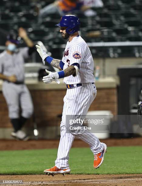 Tomas Nido of the New York Mets celebrates his two run home run in the sixth inning against the Colorado Rockies at Citi Field on May 25, 2021 in the...