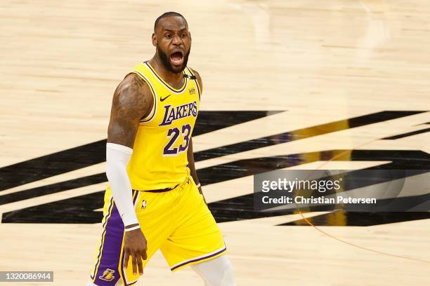 LeBron James of the Los Angeles Lakers reacts to a three-point shot against the Phoenix Suns during the second half of Game Two of the Western...