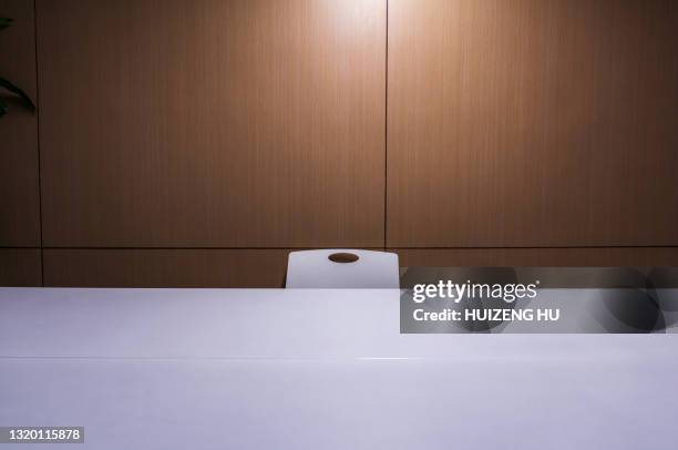 chair in the office - interrogatorio foto e immagini stock