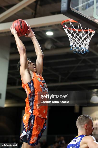 Mojave King of the Taipans dunks the ball during the round 20 NBL match between the Cairns Taipans and the Brisbane Bullets at Cairns Pop Up Arena,...
