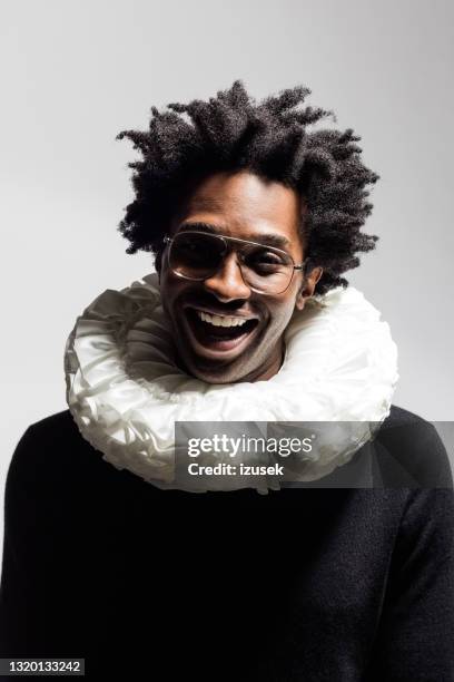 happy man wearing neck ruff - ruffle collar stock pictures, royalty-free photos & images