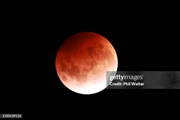 The Total Lunar Eclipse of the Moon is seen on May 26, 2021 in Auckland, New Zealand. It is the first total lunar eclipse in more than two years,...