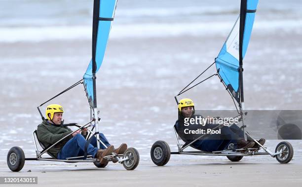 Prince William, Duke of Cambridge and Catherine, Duchess of Cambridge take part in a land yachting session on West Sands beach on May 26, 2021 in St...