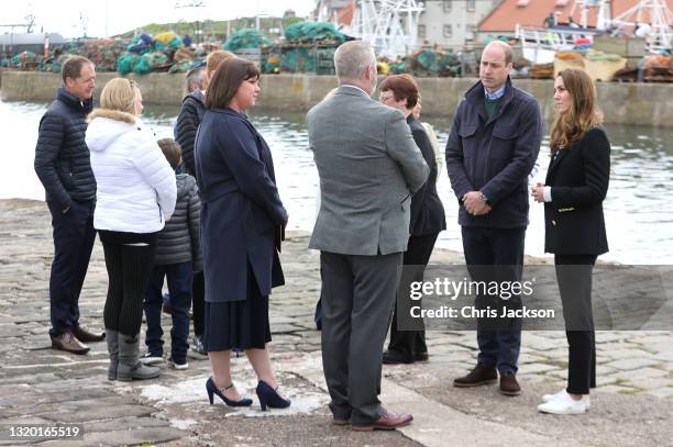 Prince William, Duke of Cambridge and Catherine, Duchess of Cambridge meet local fishermen and their families to hear about the work of fishing...