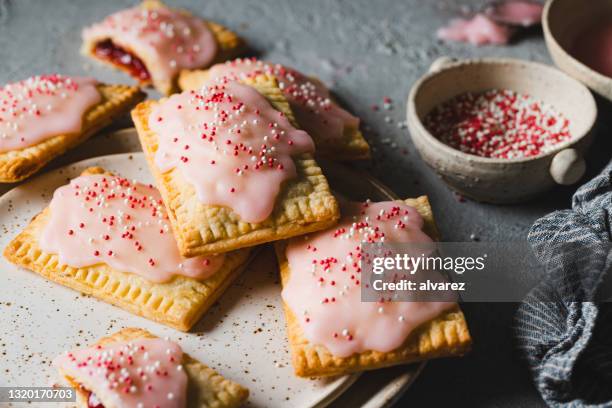 homemade strawberry pop tarts - pop tarts stock pictures, royalty-free photos & images