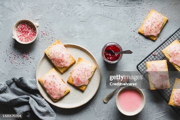 jam filled pastry tarts - strawberry jam stock pictures, royalty-free photos & images