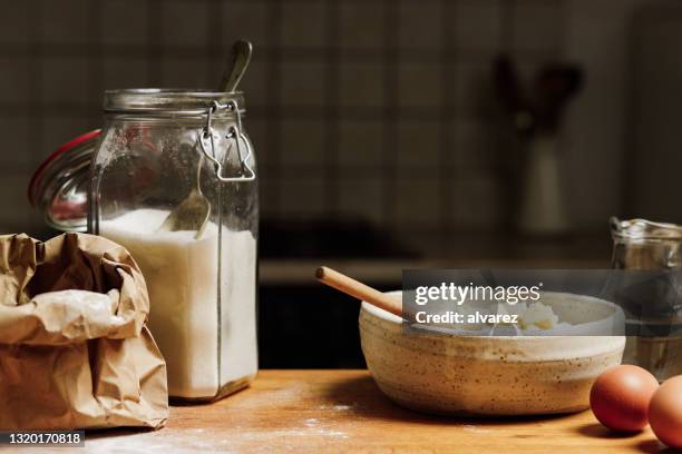 baking ingredients on kitchen table - cookies jar stock pictures, royalty-free photos & images