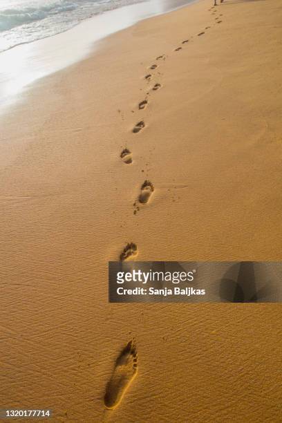 footprints in the sand - heaven stairs stock pictures, royalty-free photos & images