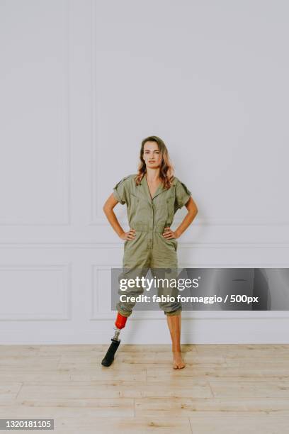 beautiful woman with prosthesis leg - editorial photography stock pictures, royalty-free photos & images