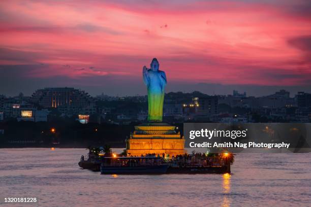 the massive granite statue of lord buddha in hussain sagar lake - hyderabad india stock pictures, royalty-free photos & images