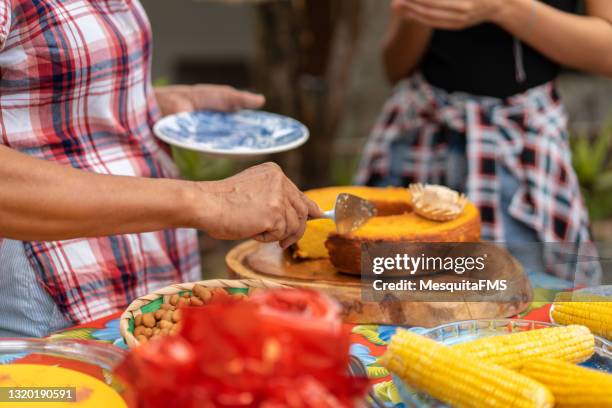 serving corn cake - cake table stock pictures, royalty-free photos & images