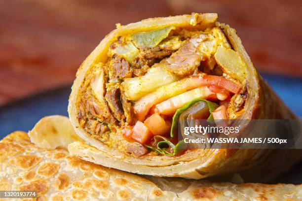 close-up of food in plate - shawarma stock-fotos und bilder