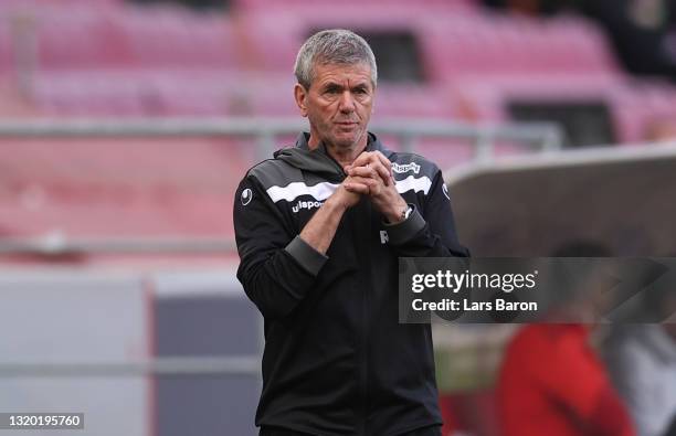 Head coach Friedhelm Funkel of Koeln reacts during the Bundesliga playoff first leg match between 1. FC Koeln and Holstein Kiel at...