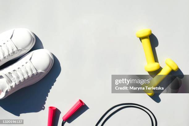 conceptual modern photo with sports equipment. - hand weight stock pictures, royalty-free photos & images