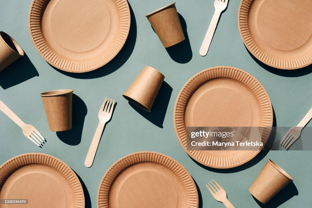Craft dishes on a green background.