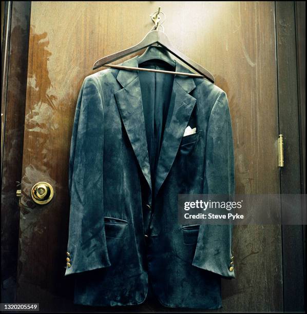 Dusty jacket hanging on the back of a door at the Deutsche Bank Building at Ground Zero after the 9/11 attacks on The World Trade Center, New York...