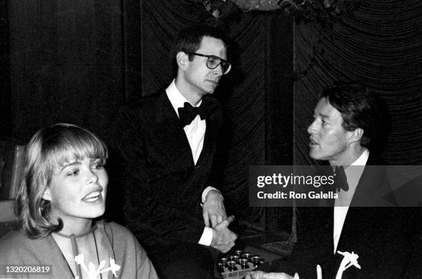 Margaux Hemingway, Anthony Perkins and Halston attend "The Towering Inferno" Premiere Party at the Four Seasons Hotel in New York City on December...