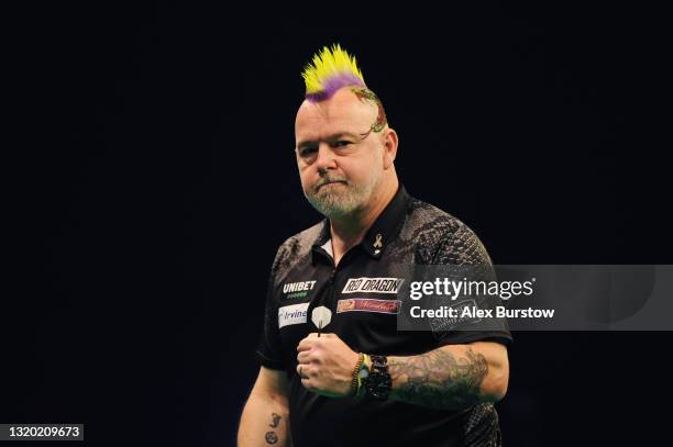 Peter Wright of Scotland celebrates in his match against Jonny Clayton of Wales during Night 15 of the Unibet Premier League Darts at Marshall Arena...