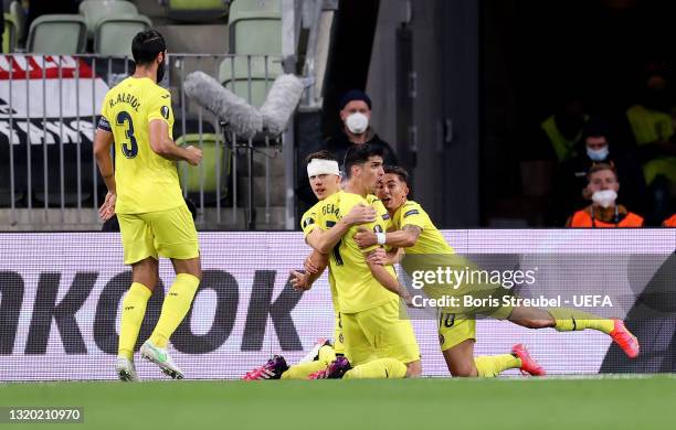 Gerard Moreno of Villarreal CF celebrates with Yeremi Pino and Juan Foyth after scoring their side's first goal during the UEFA Europa League Final...