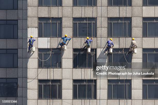 Office Building Window Cleaner Window Cleaning Equipment Photos and Premium High Res Pictures - Getty ...