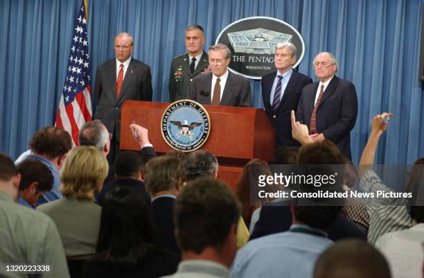 Defense Secretary Donald Rumsfeld speaks during a press conference in the Pentagon briefing room, Washington DC, September 11, 2001. Only hours...