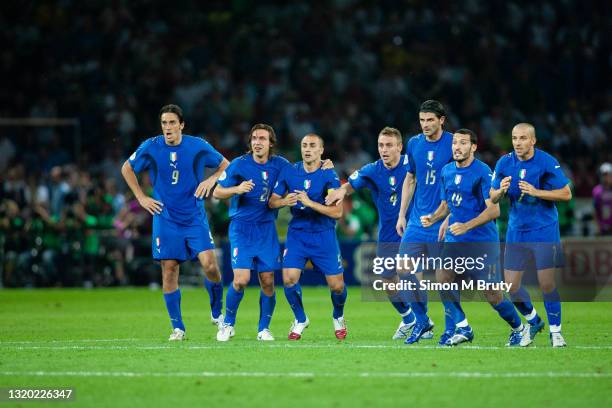 Luca Toni, Andrea Pirlo, Fabio Cannavaro, Daniele De Rossi, Vincenzo Iaquinta, Gianluca Zambrotta and Alessandro Del Piero of Italy watch as the...