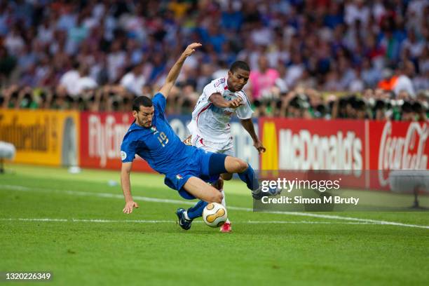 Gianluca Zambrotta of Italy and Florent Malouda of France in action during the World Cup Final match between France and Italy . Italy would win on...