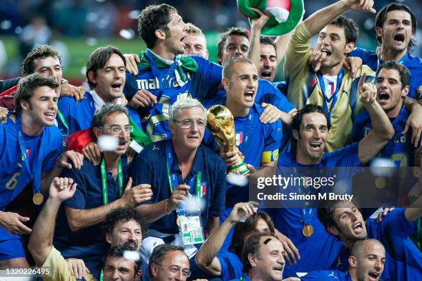 Fabio Cannavaro and Marcello Lippi coach of the Italian team with the World Cup Trophy. World Cup Final match between France and Italy . Italy would...
