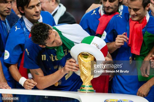 Marco Materazzi of Italy putting a hat on the World Cup Trophy. World Cup Final match between France and Italy . Italy would win on penalties to at...