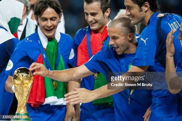 Alessandro Del Piero of Italy touching the World Cup Trophy. World Cup Final match between France and Italy . Italy would win on penalties to at the...