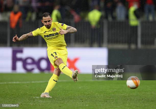 Paco Alcacer of Villarreal scores their team's third penalty in the penalty shoot out during the UEFA Europa League Final between Villarreal CF and...