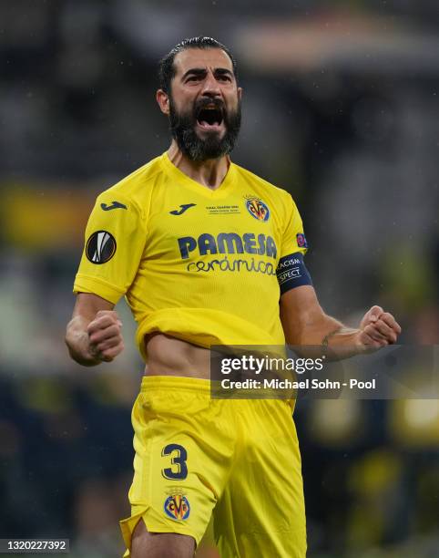 Raul Albiol of Villarreal celebrates scoring their team's seventh penalty in the penalty shoot out during the UEFA Europa League Final between...