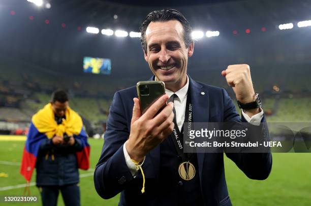 Unai Emery, Head Coach of Villarreal CF celebrates their side's victory after the UEFA Europa League Final between Villarreal CF and Manchester...