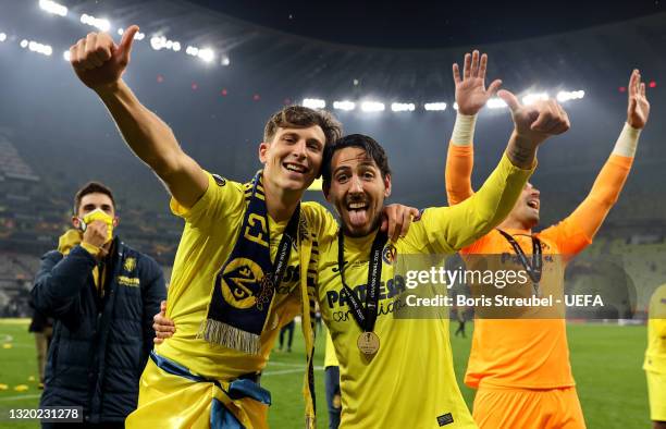 Pau Torres and Dani Parejo of Villarreal CF celebrates their side's victory after the UEFA Europa League Final between Villarreal CF and Manchester...