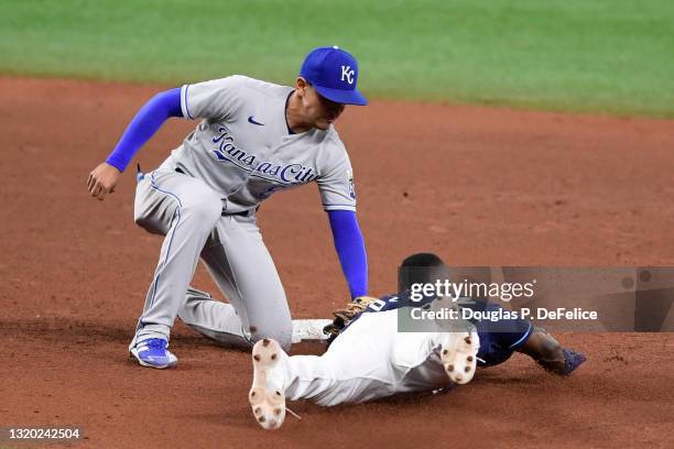 Randy Arozarena of the Tampa Bay Rays is caught stealing second base by Nicky Lopez of the Kansas City Royals during the fifth inning at Tropicana...