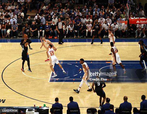 Derrick Rose of the New York Knicks takes a shot as Bogdan Bogdanovic of the Atlanta Hawks defends during game two of the Eastern Conference...