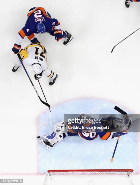 Ilya Sorokin of the New York Islanders makes the toe save on Evgeni Malkin of the Pittsburgh Penguins in Game Six of the First Round of the 2021...
