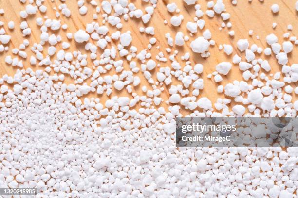 isomalt(sugar substitute) white crystalline grains ingredient - artificial sweetener stock pictures, royalty-free photos & images