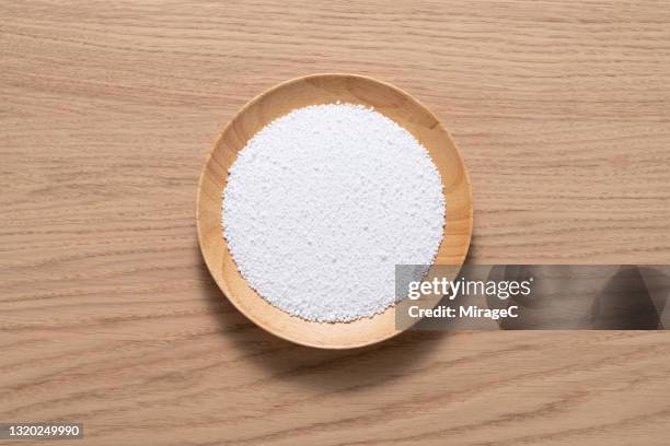 isomalt(sugar substitute) white crystalline grains ingredient - artificial sweetener stock pictures, royalty-free photos & images
