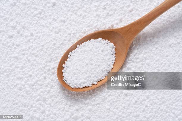 isomalt(sugar substitute) white crystalline grains ingredient - artificial sweetener stock pictures, royalty-free photos & images