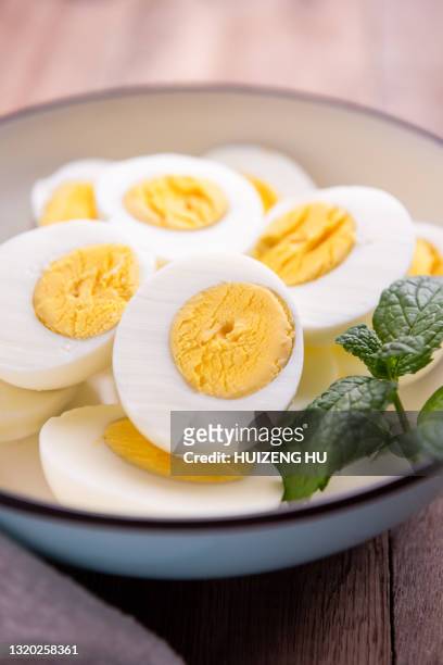 boiled eggs in a bowl - hard boiled eggs stock pictures, royalty-free photos & images