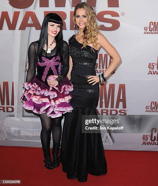 Recording artists Susie Brown and Danelle Leverett of The JaneDear Girls arrive at the 45th annual CMA Awards at the Bridgestone Arena on November 9,...