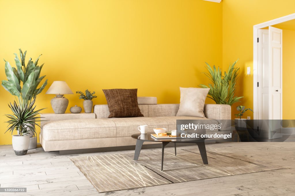 Modern Living Room Interior With Sofa, Potted Plants And Yellow Color Wall