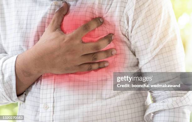 close up of man is heart attack - 心臓病 ストックフォトと画像